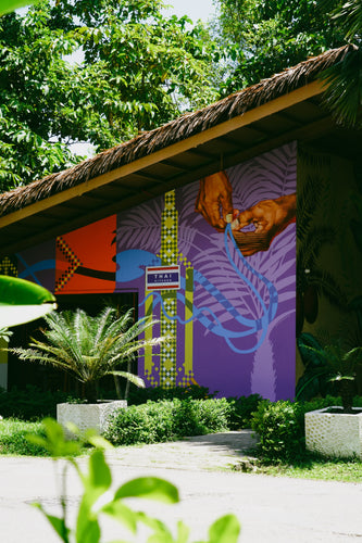 Exterior of Thai Kitchen restaurant in Kalye Artisano, featuring a welcoming entrance with traditional Thai decor and signage.