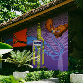 Exterior of Thai Kitchen restaurant in Kalye Artisano, featuring a welcoming entrance with traditional Thai decor and signage.